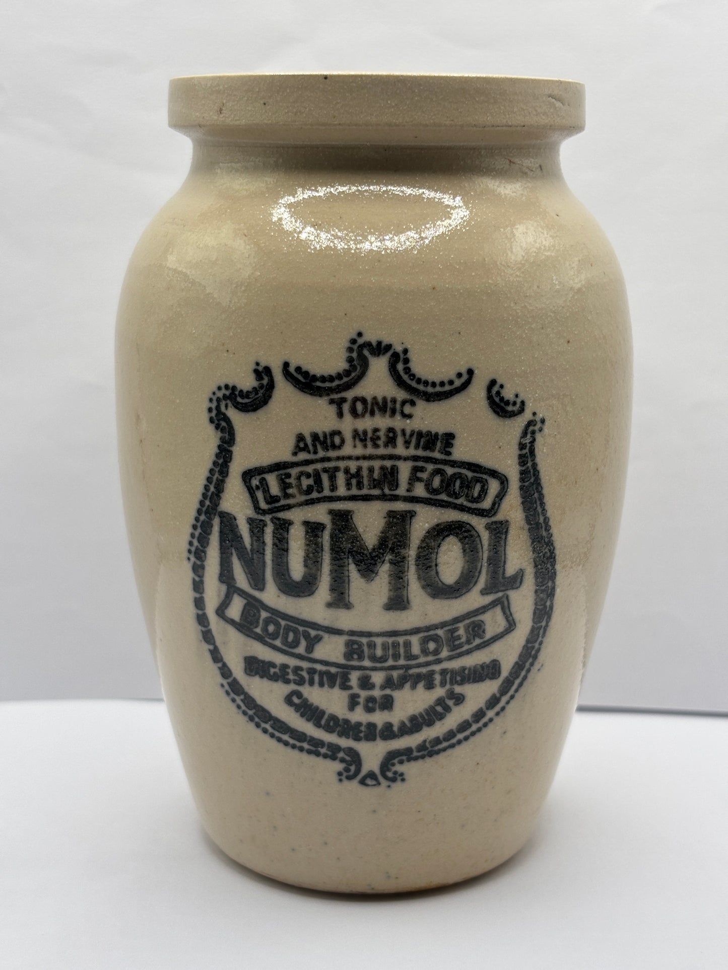 Old numol body builder advertising jar, 13cms