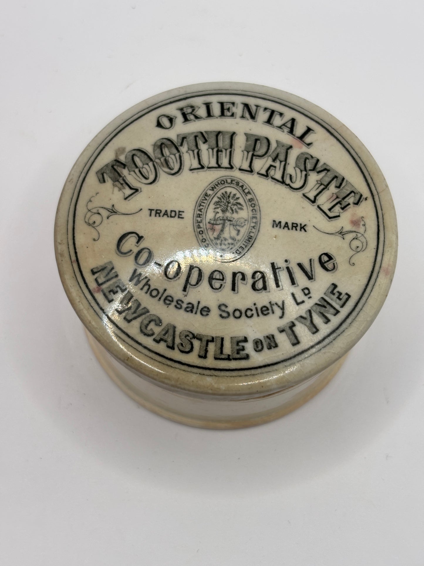 Old advertising lid and base, oriental toothpaste