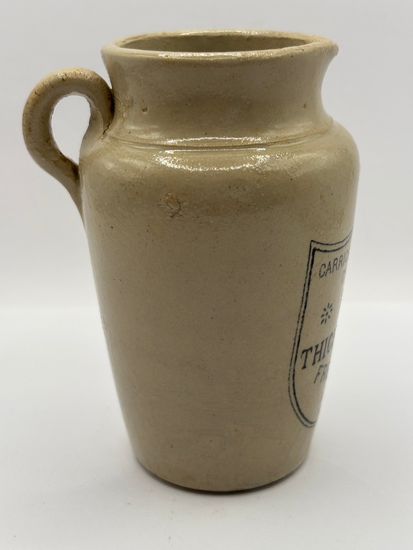 Old advertising cream pot, Carricks pure thick cream with handle. Black print 10cms
