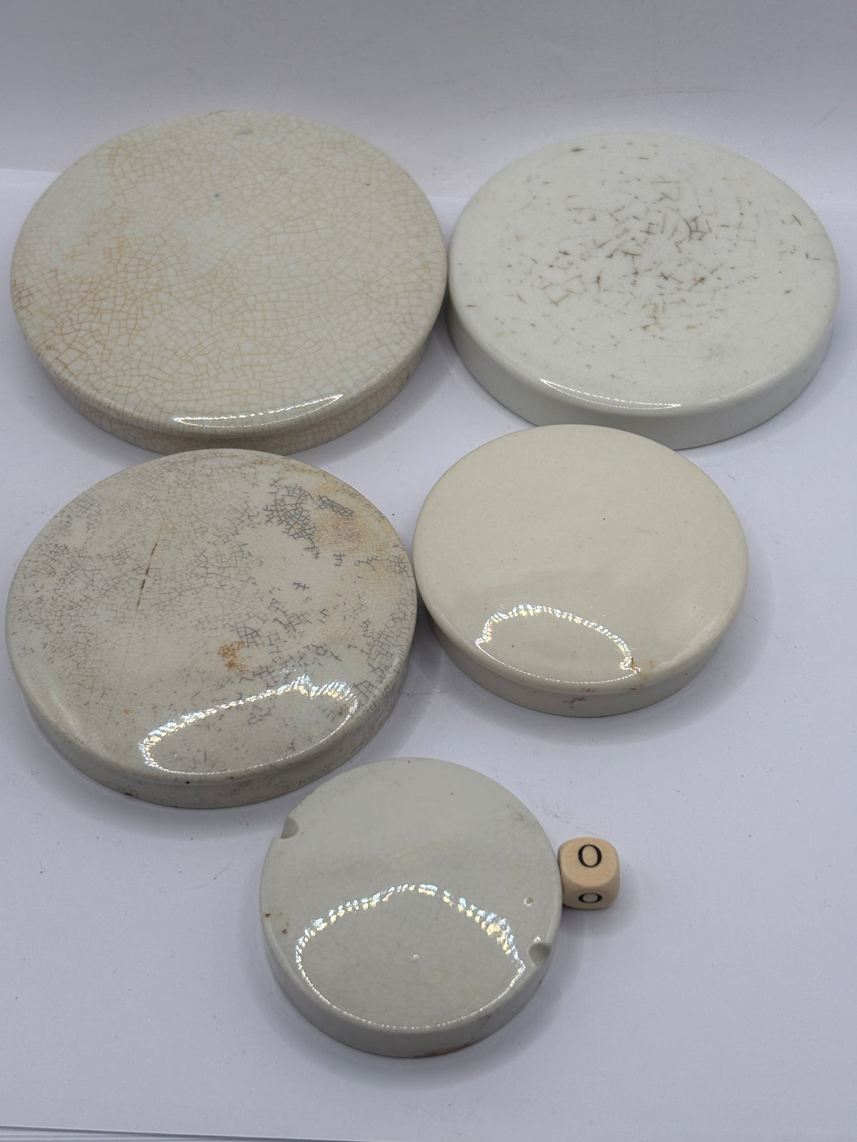 5 old stoneware lids, stackers (o)