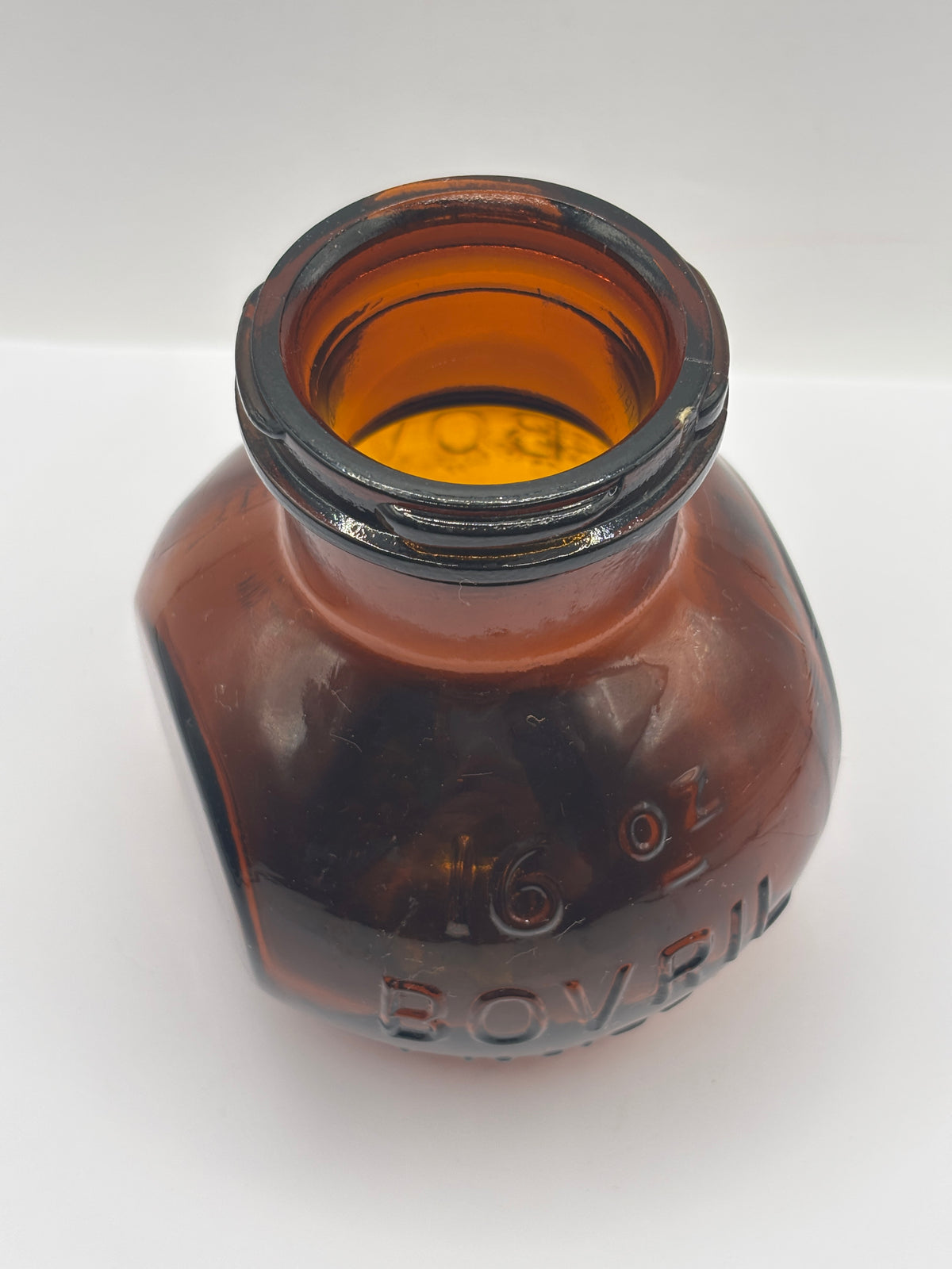 Old 16oz amber glass advertising Bovril bottle
