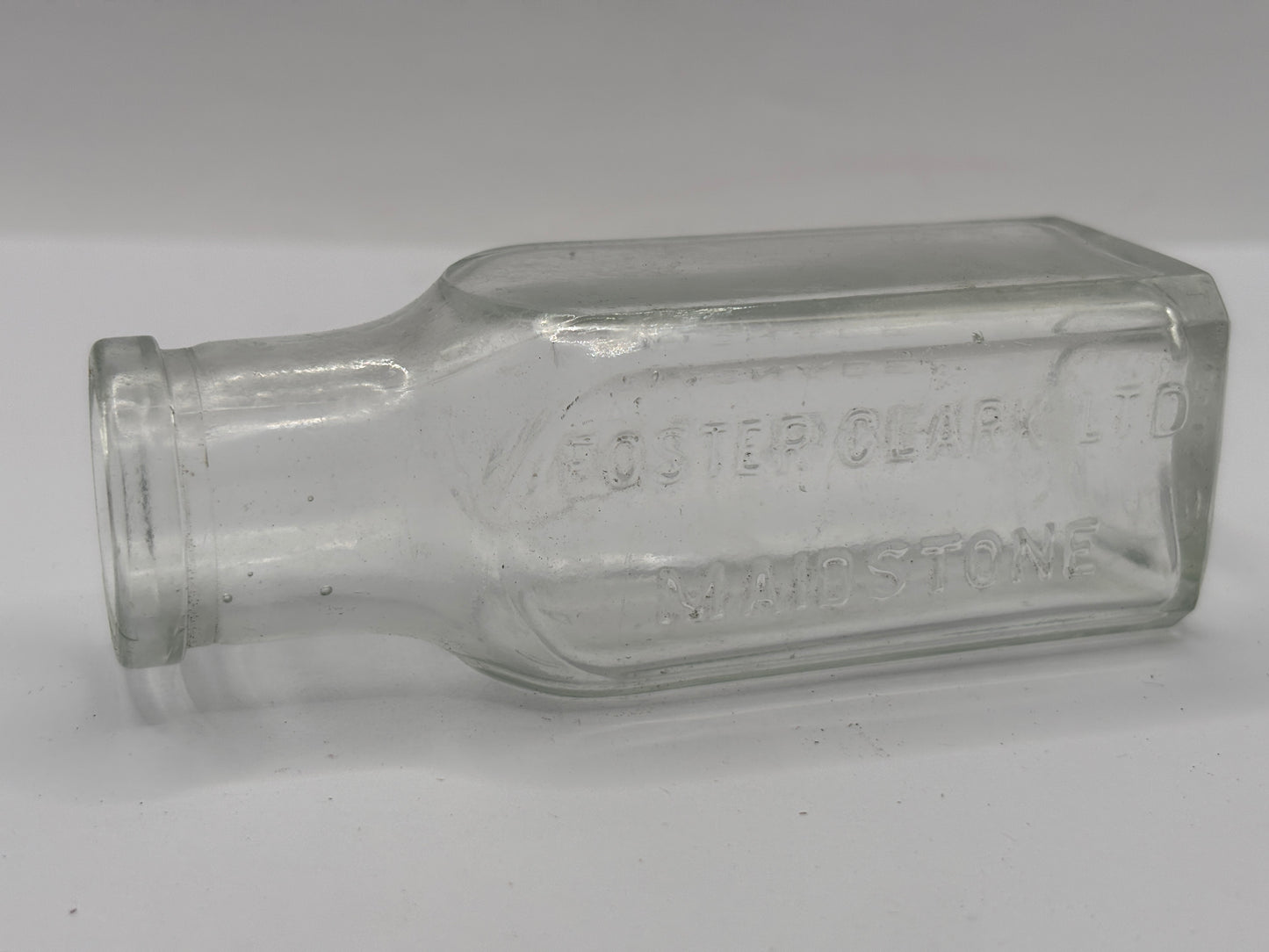Old clear glass Eiffel tower lemonade bottle