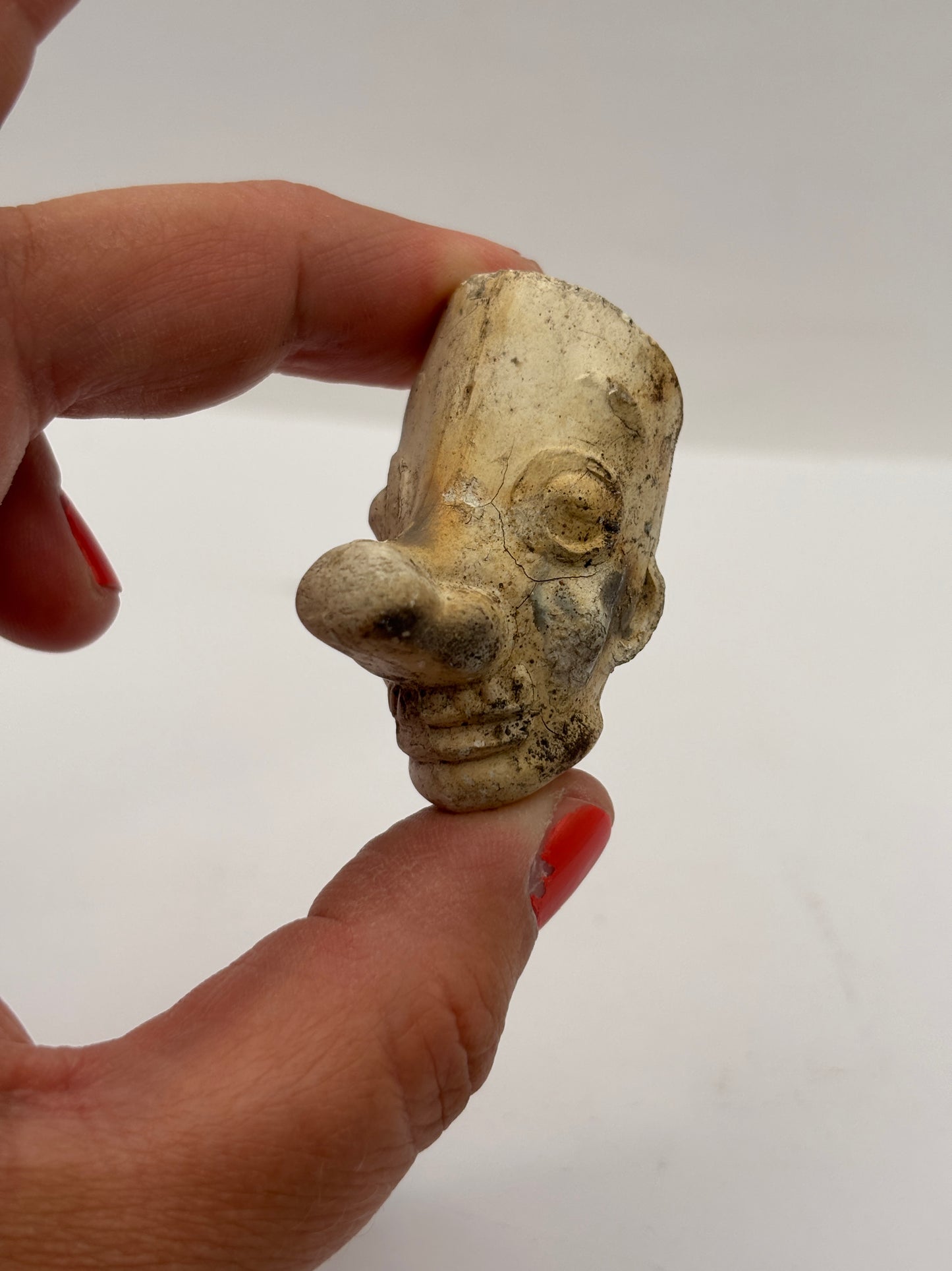 Old figural clay pipe head, pipe bowl. Ally sloper