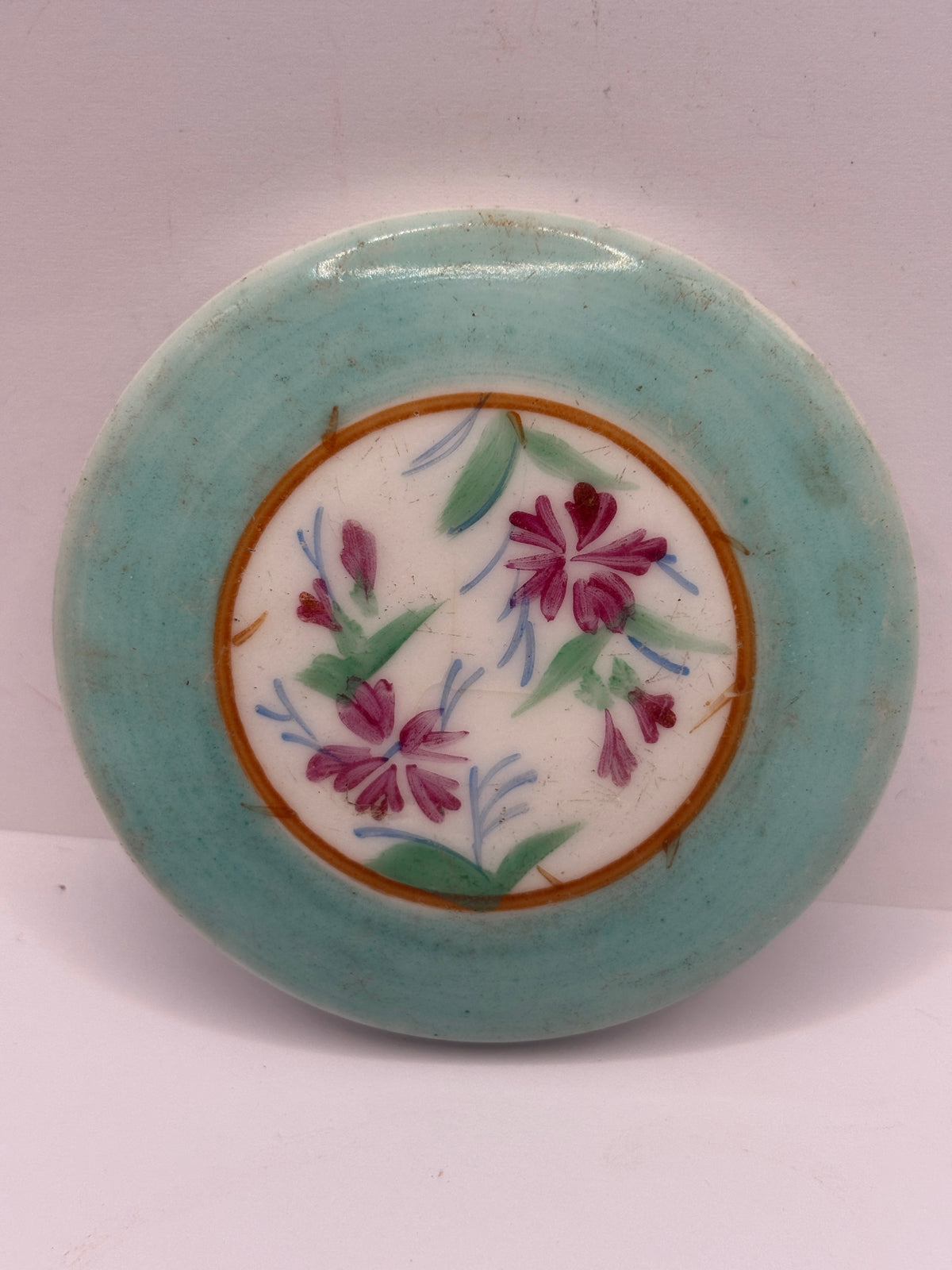 Old decorative stoneware lid, hand painted?