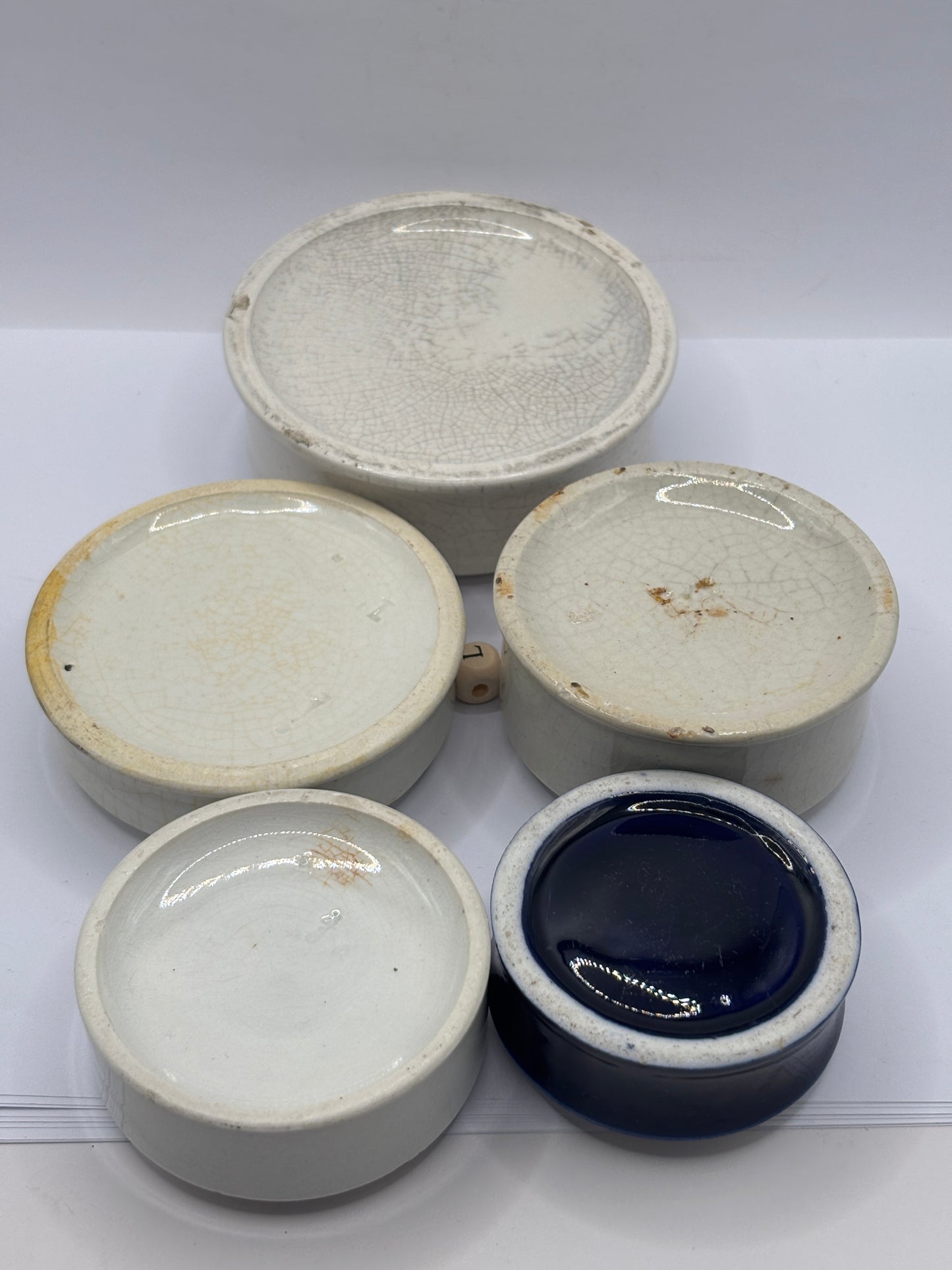 5 old stoneware bases, stackers (L) damages