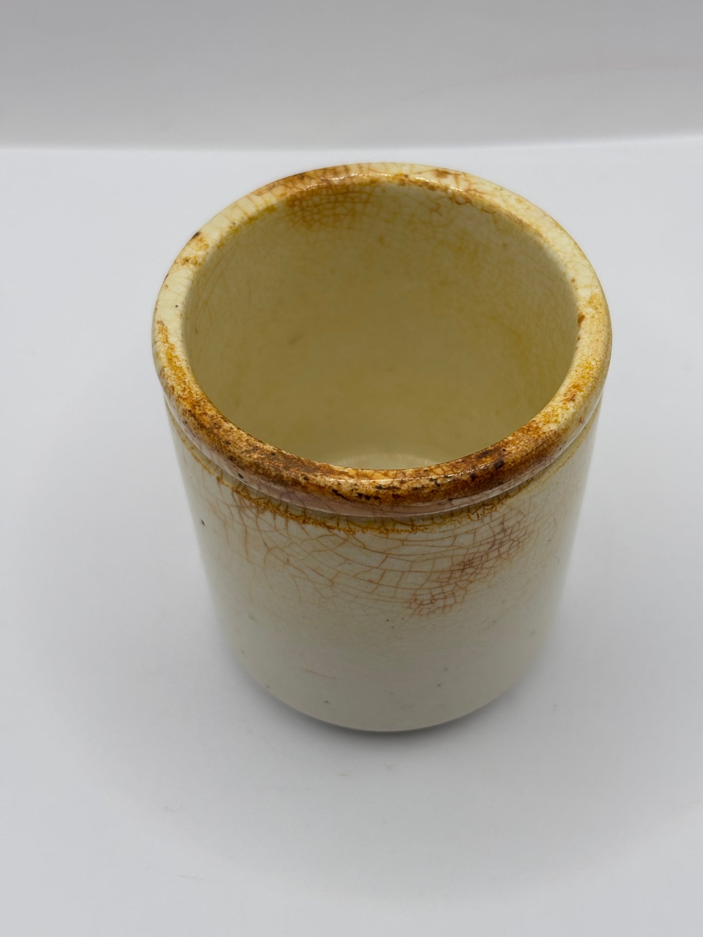 Old white stoneware jar