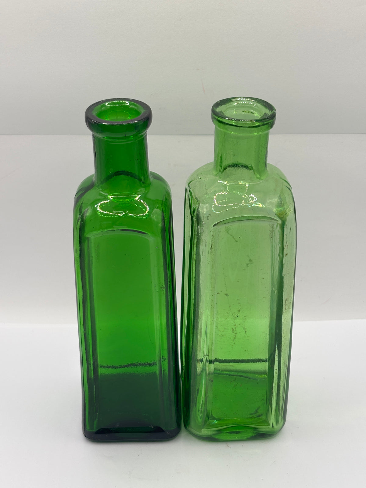 2 old green glass IZAL bottles 18.5cms