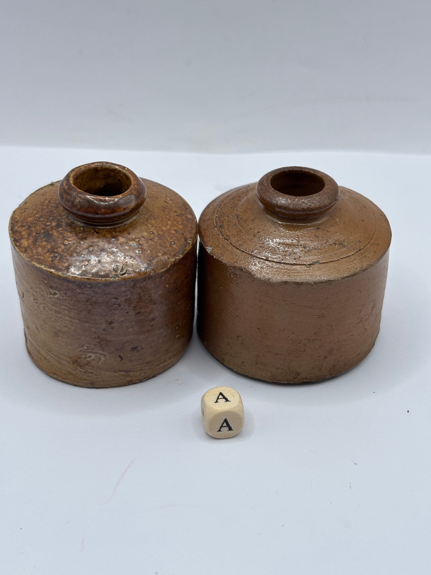 2 brown stoneware inkwells, ink bottles (a) pork pie inks