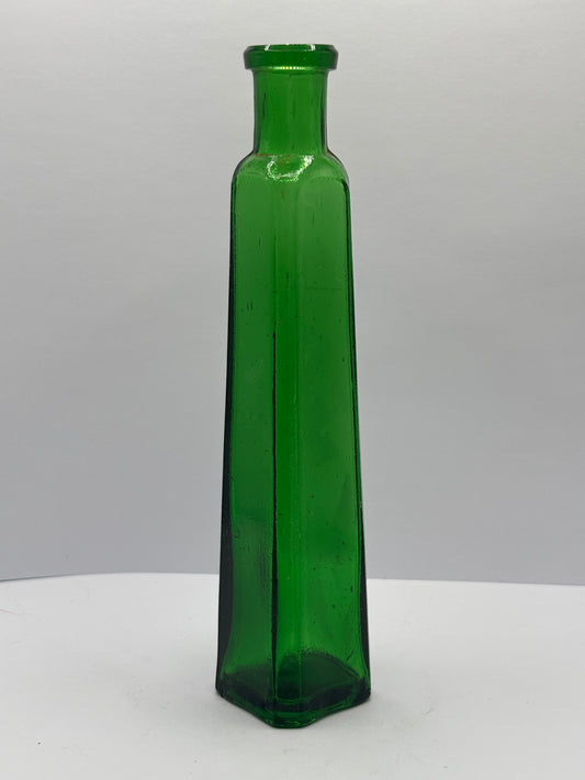 Old tall green glass lavendar water bottle