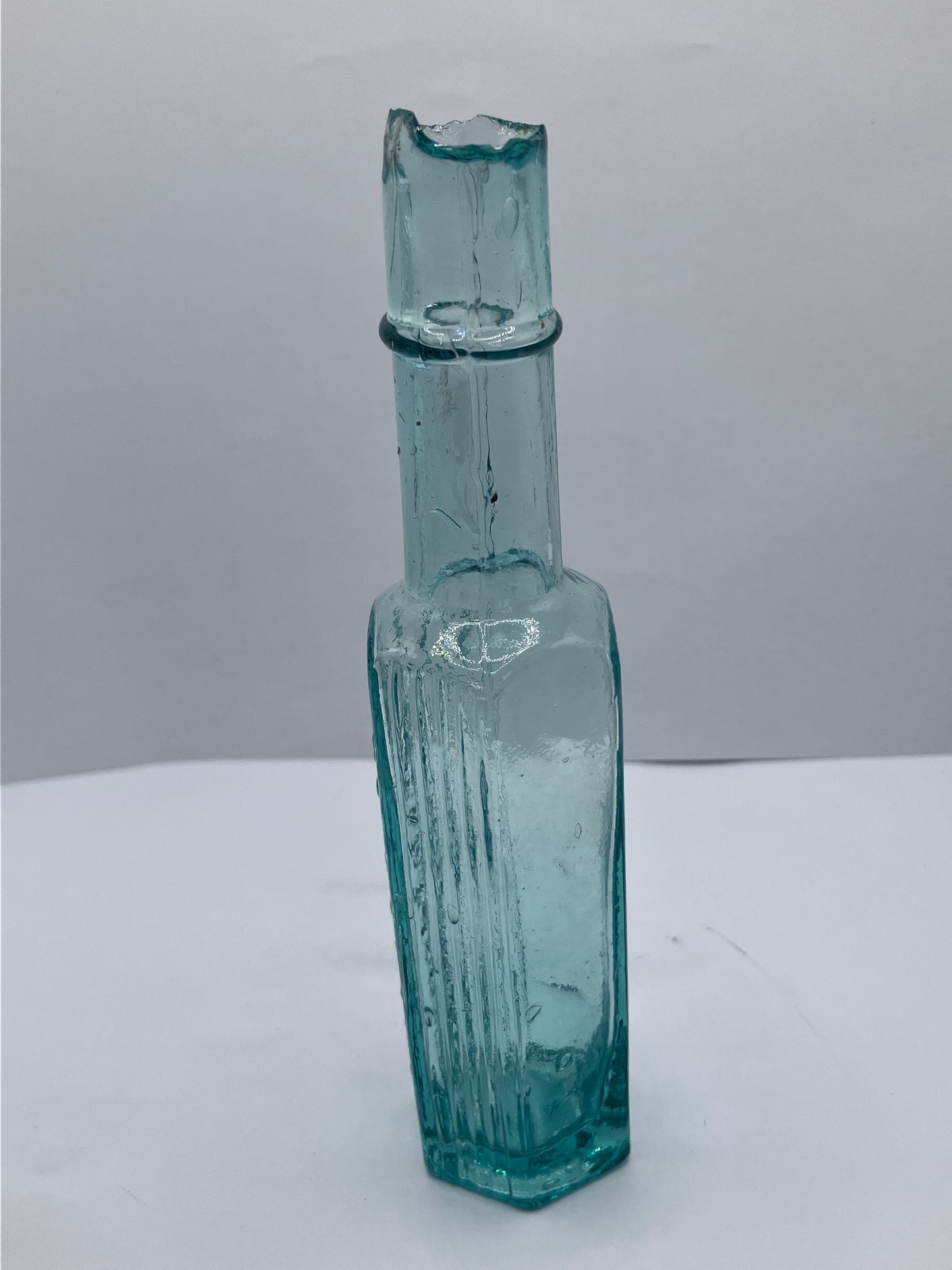 Tall slim poison bottle, poisonous not to be taken