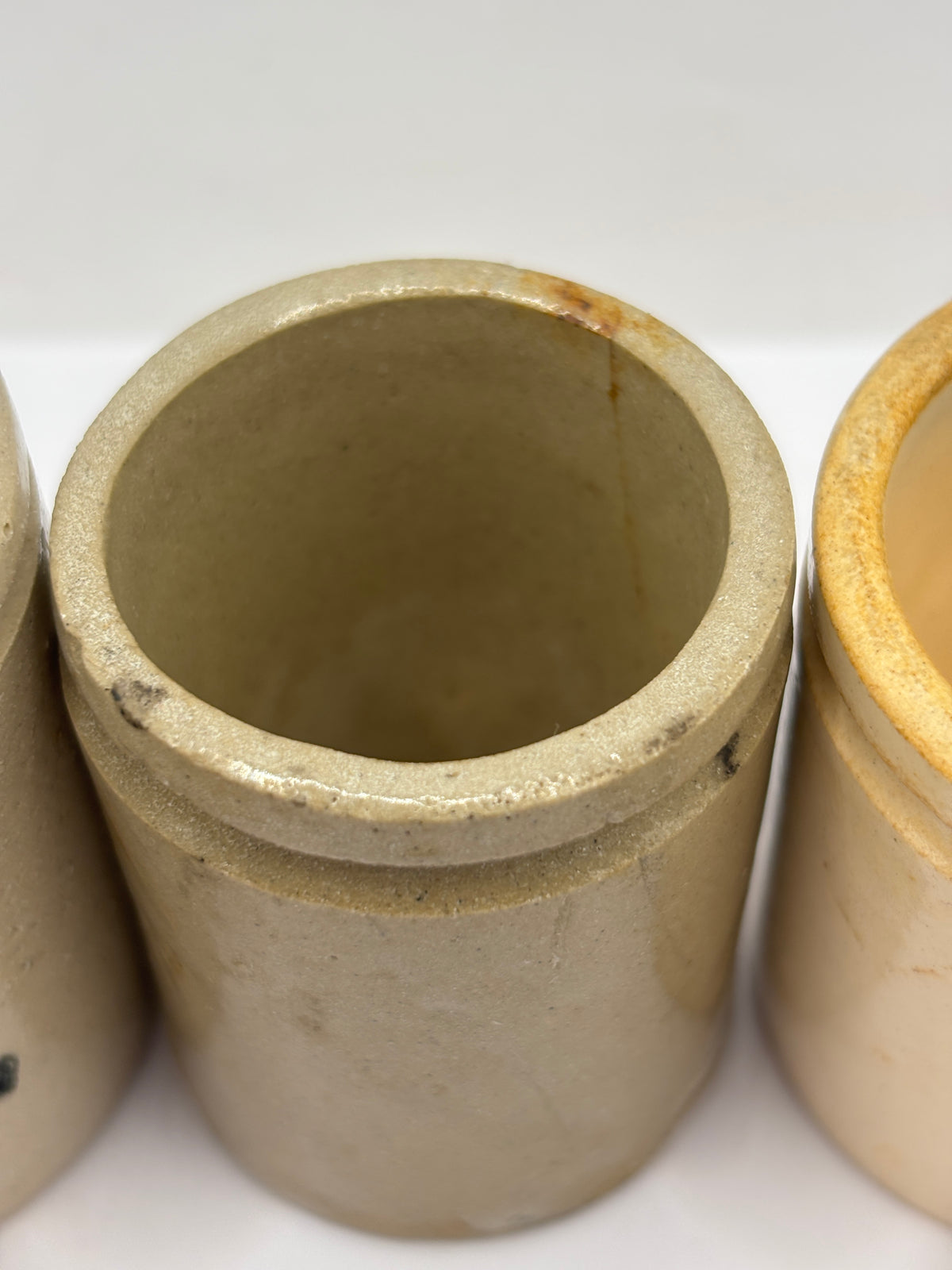 5 small stoneware pots (a)