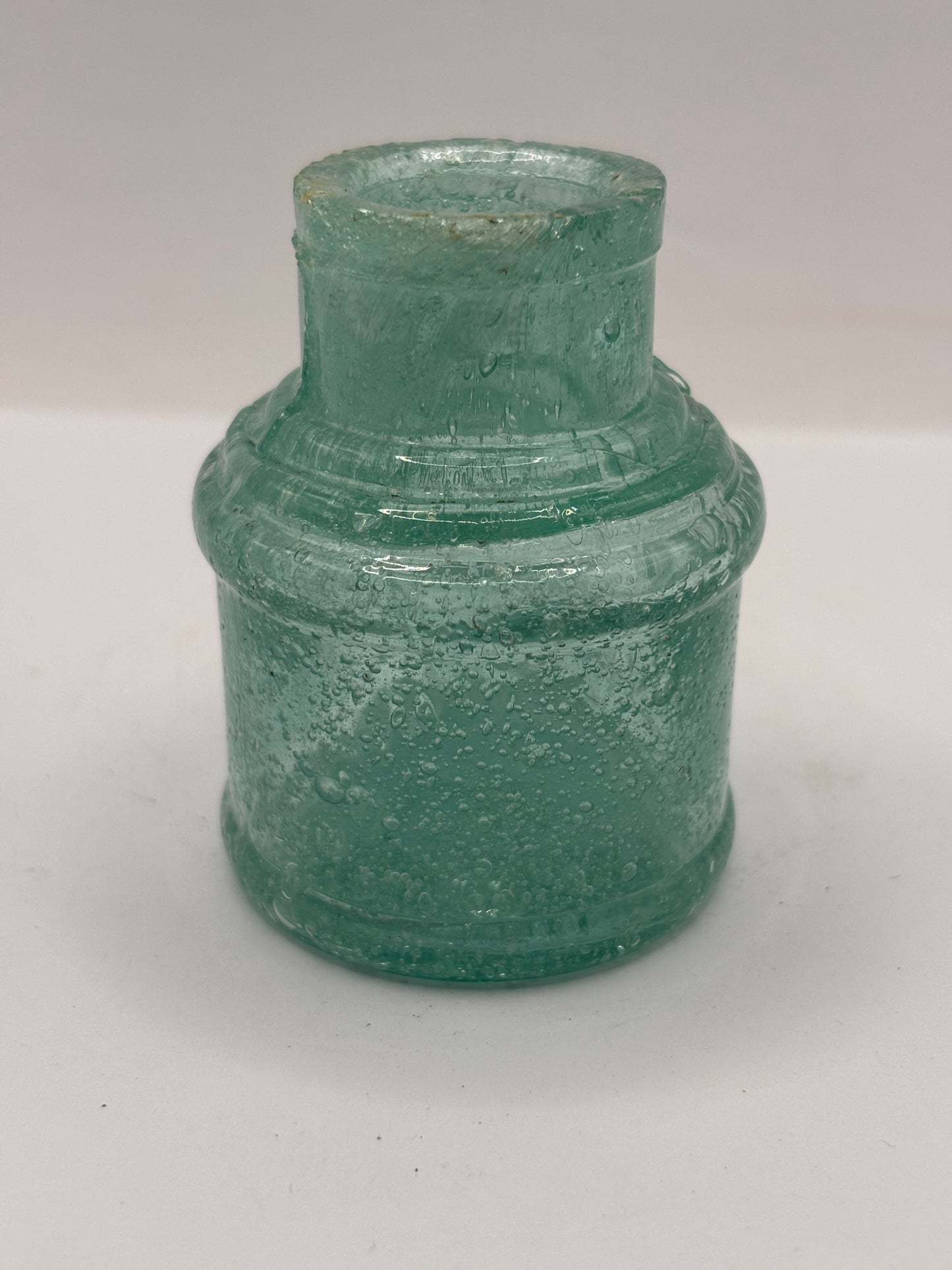 Old aqua glass ink with lots of bubbles