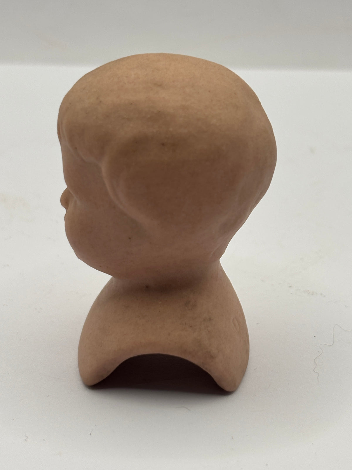 Old dolls head 5.5cms