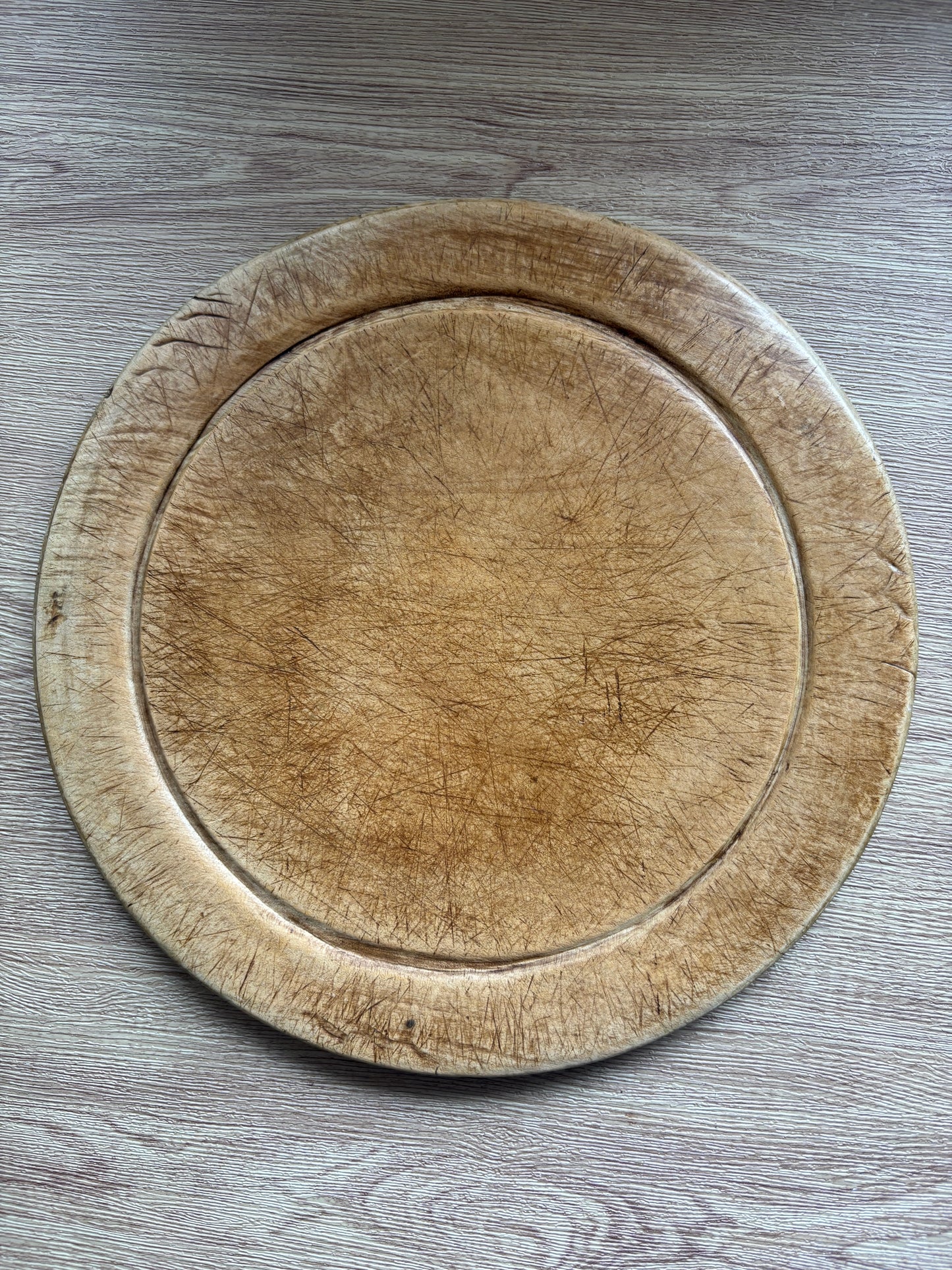 Old wooden carved bread board
