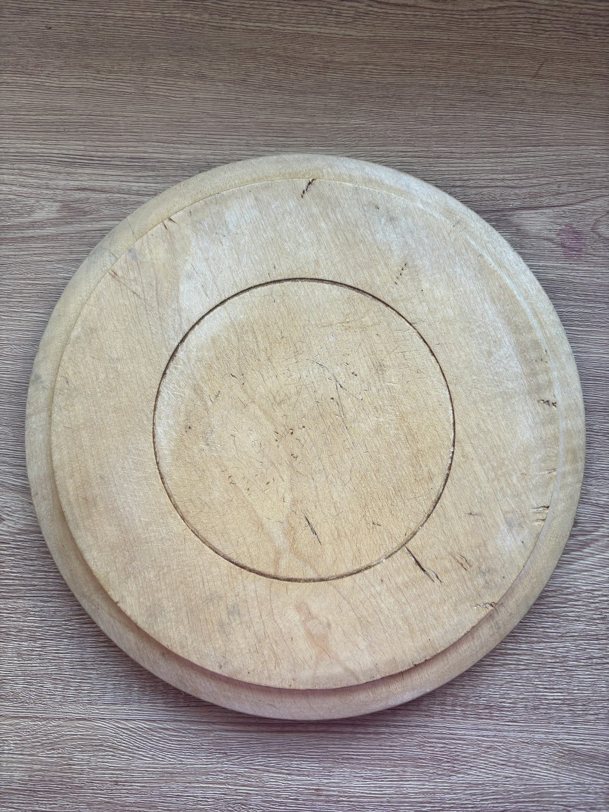 Old wooden carved bread board