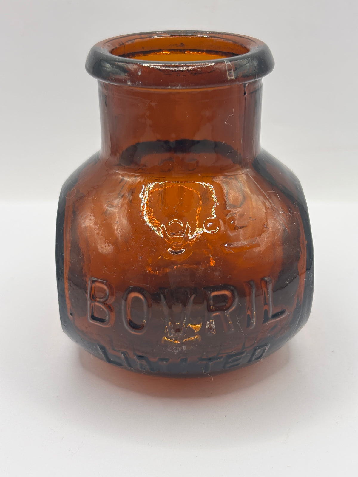 Old 8oz amber glass advertising Bovril bottle