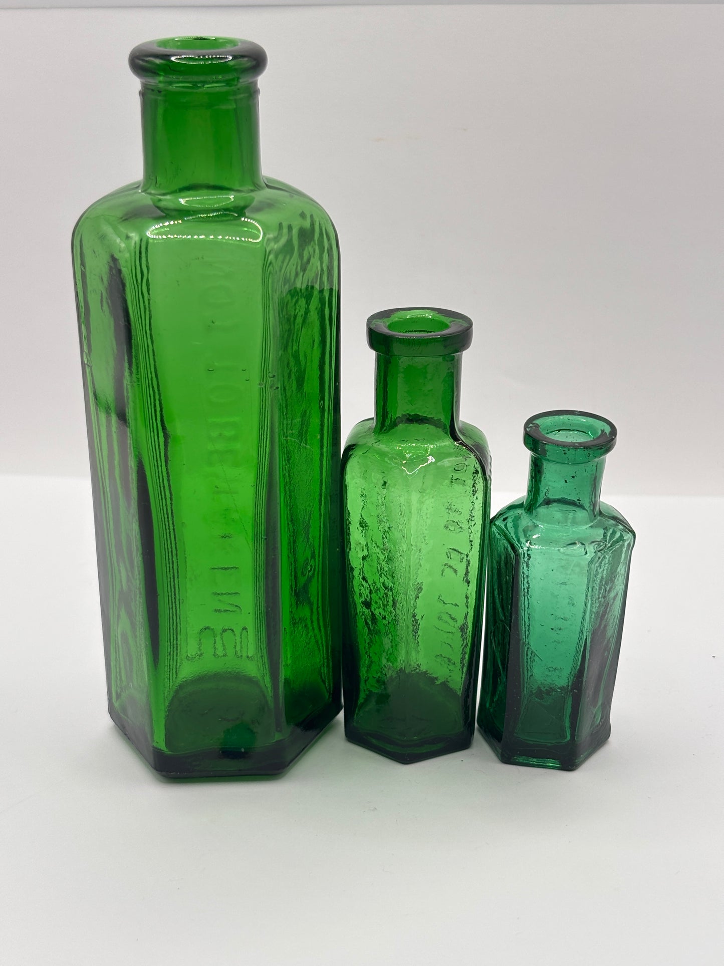 3 Old green glass poison bottles, not to be taken