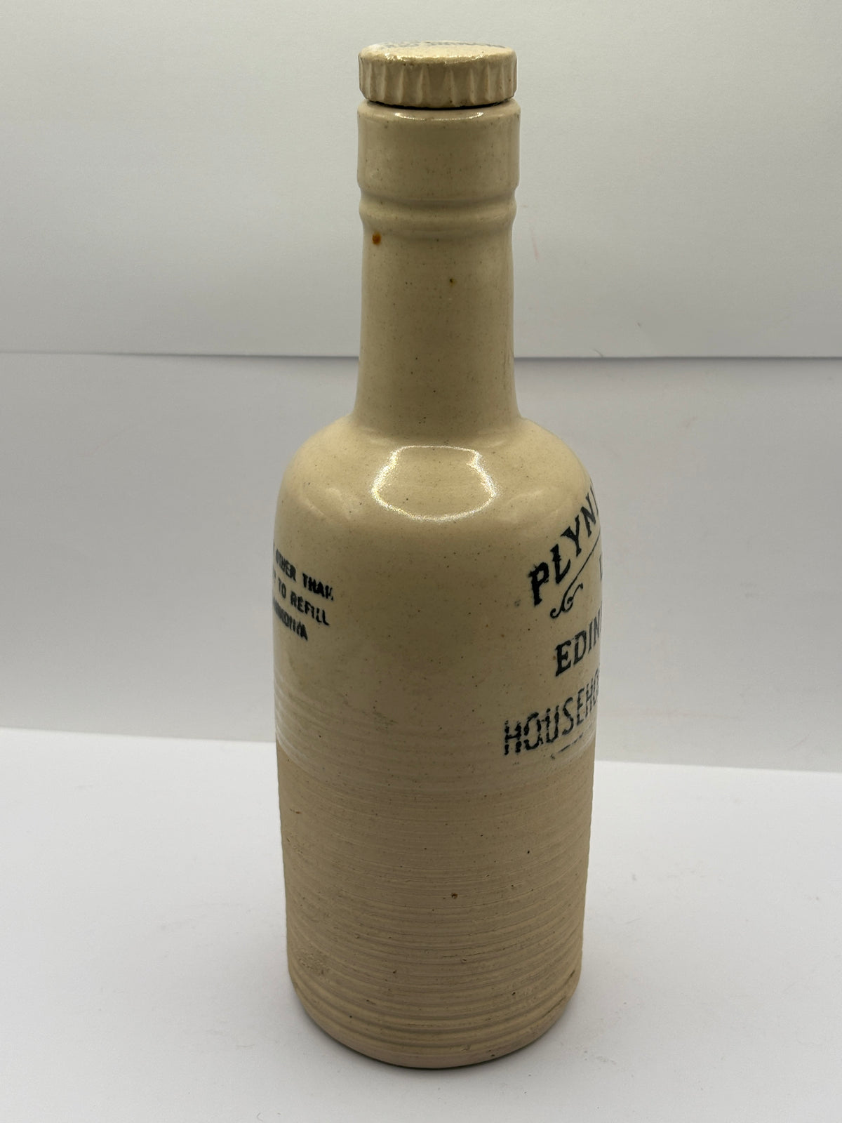 Old stoneware advertising bottle, Plynine household Ammonia with original stopper