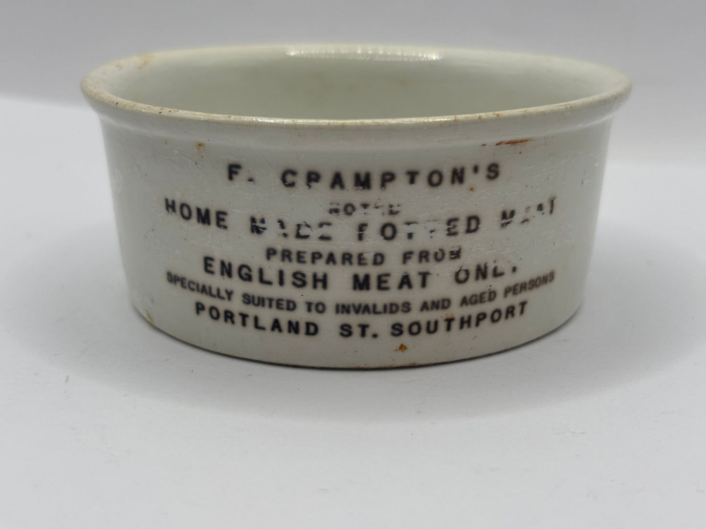 Old advertising meat paste pot. Black print, Cramptons