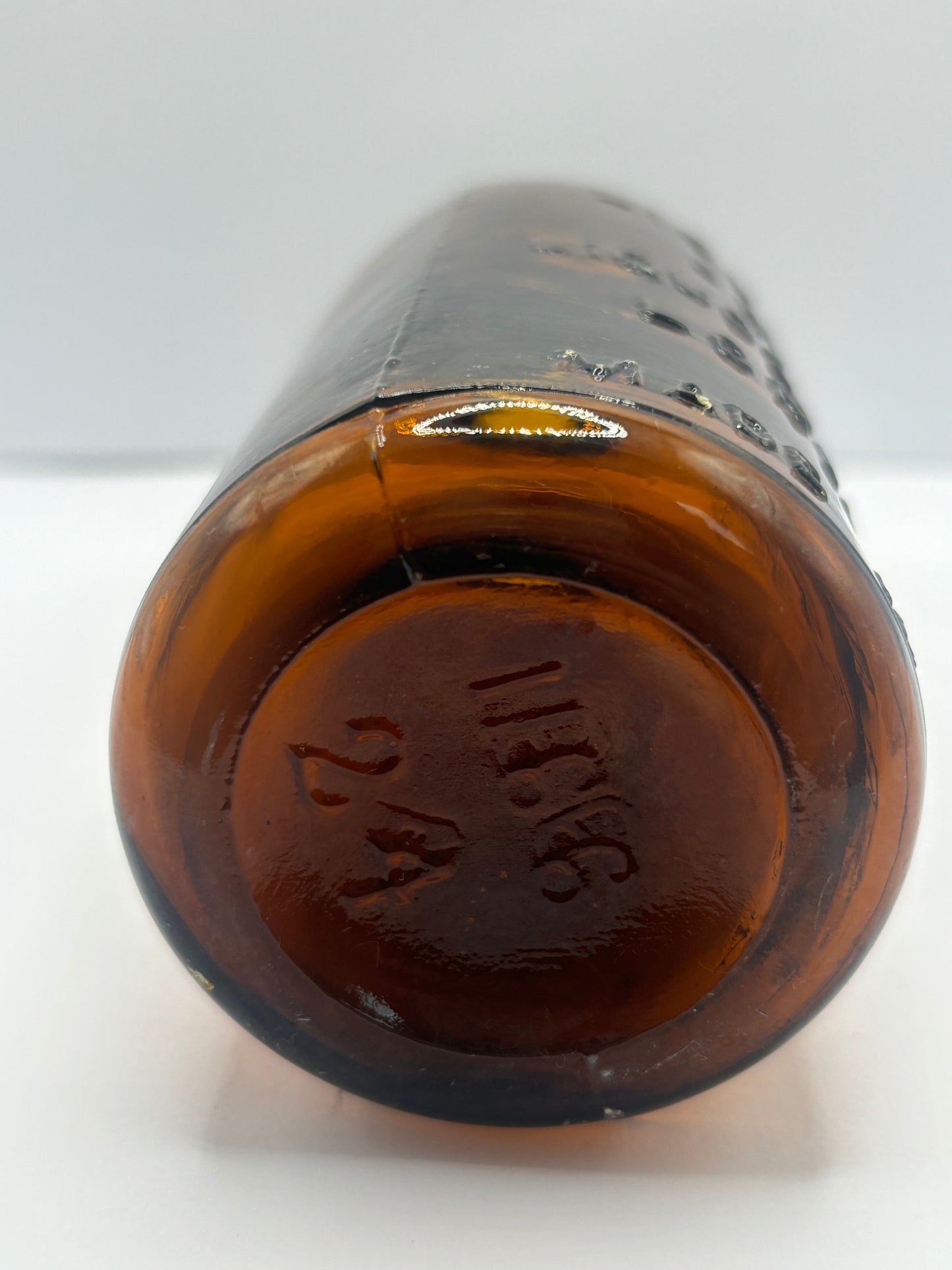 old amber glass liquozone bottle