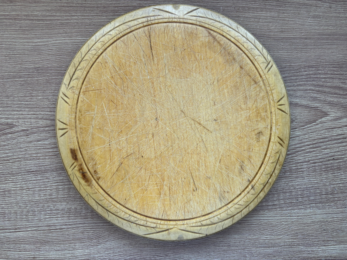 Old wooden carved bread board