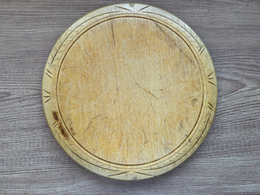 Old wooden carved bread board