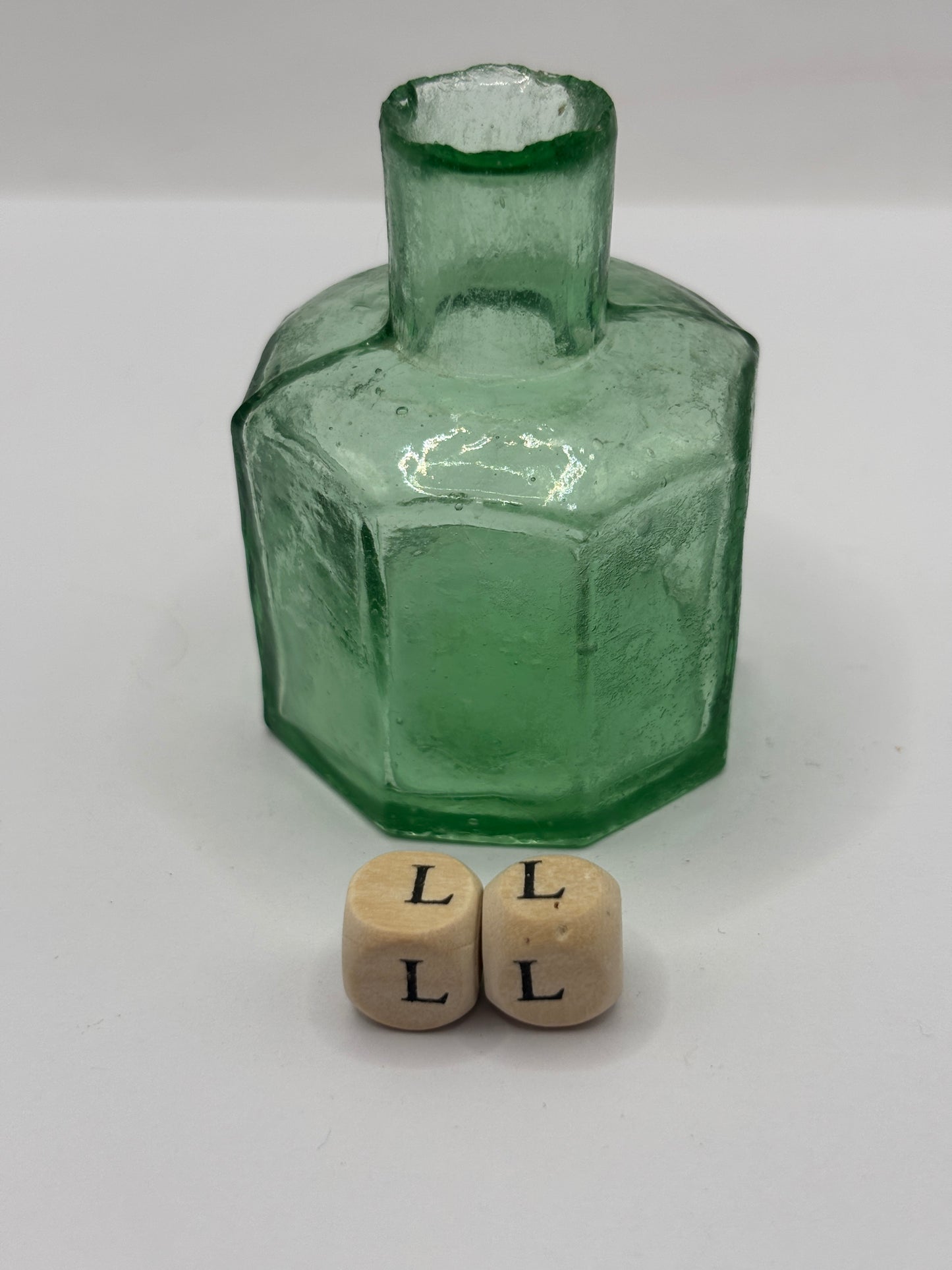 Old green glass ink, inkwell. (LL)