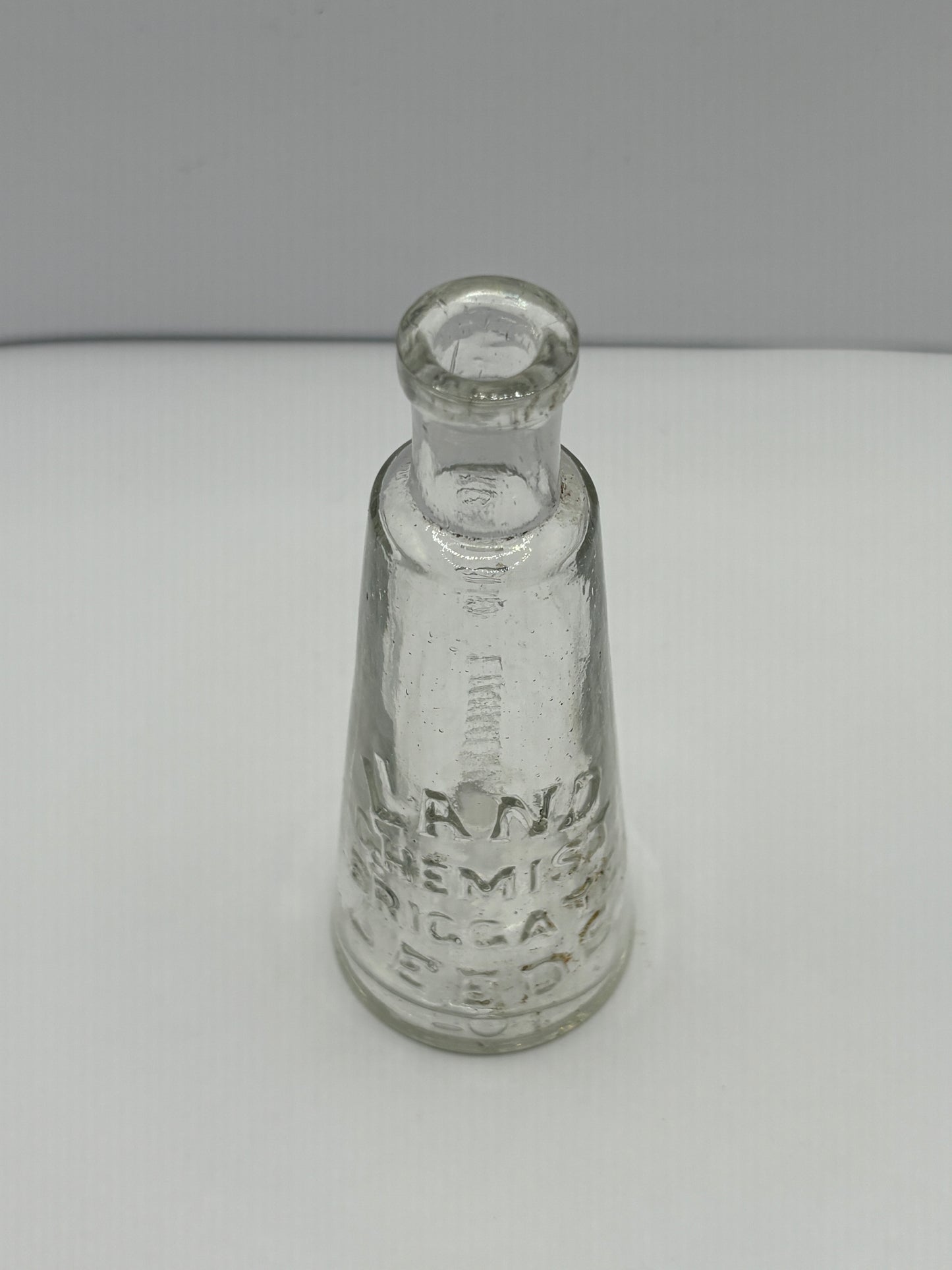 Old Leeds Rosebud liniment advertising bottle, Land chemist Briggate Leeds