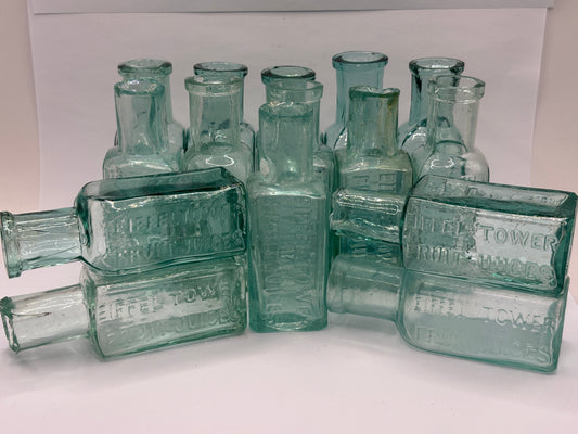 15 old Eiffel tower lemonade bottles