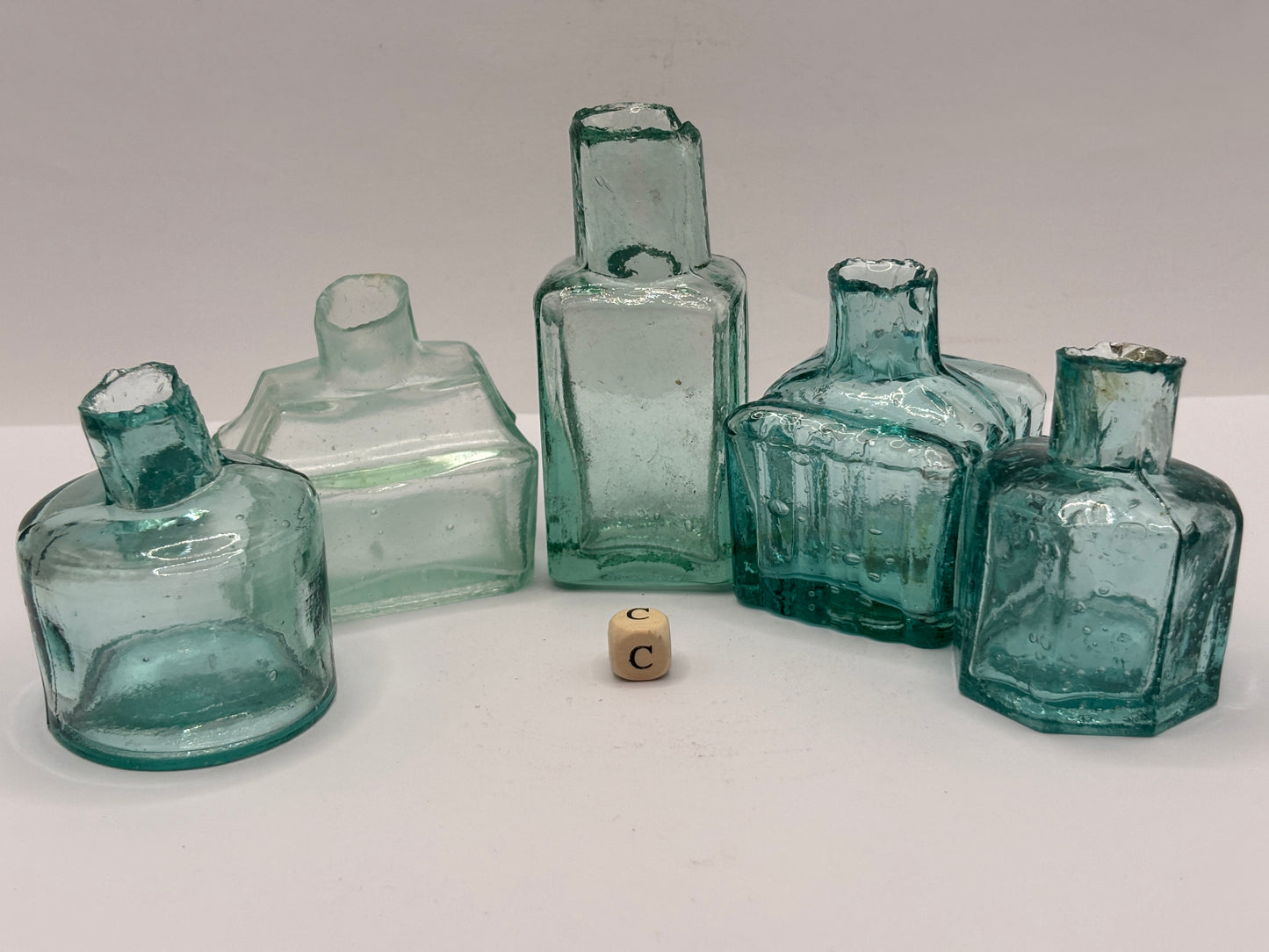 5 old aqua glass inks, inkwells, ink bottles, penny ink (c)