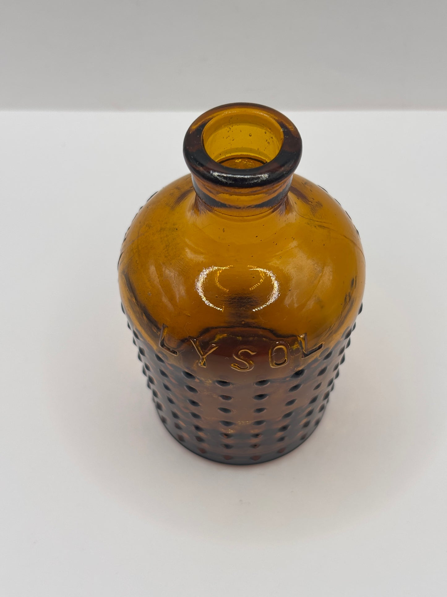 old amber glass Lysol bottle, Boots all british