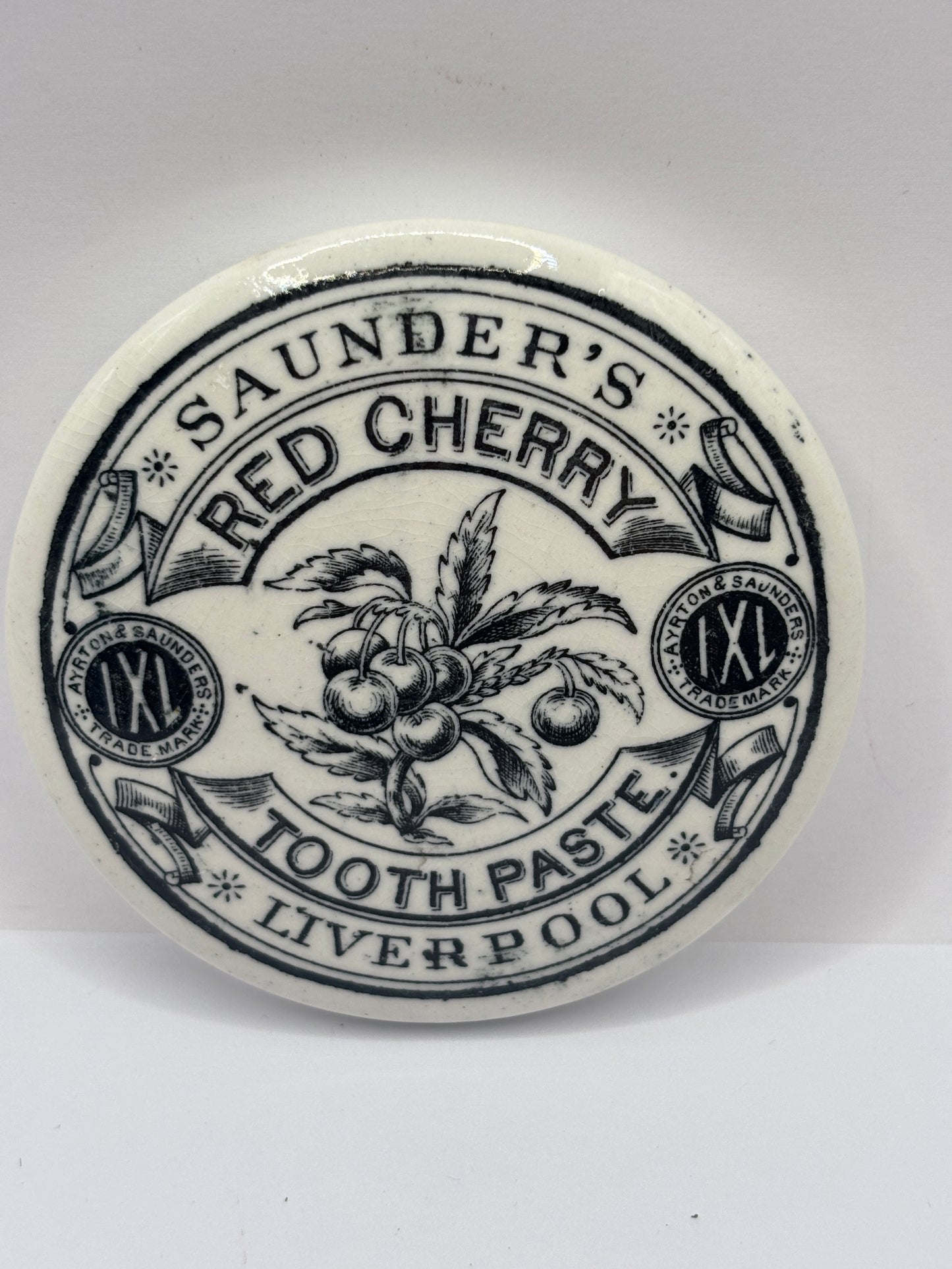 Old advertising lid, Saunder’s Red cherry tooth paste
