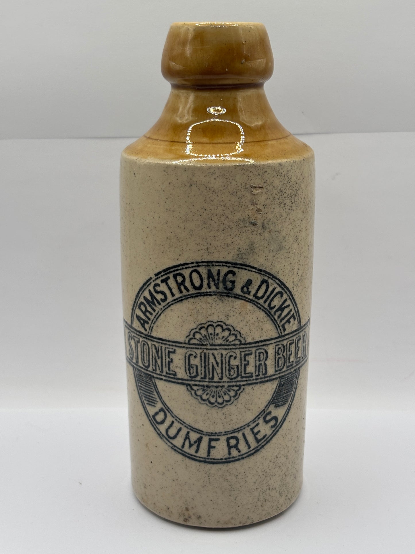 Old stoneware ginger beer bottle, Armstrong & Dickie Dumfries
