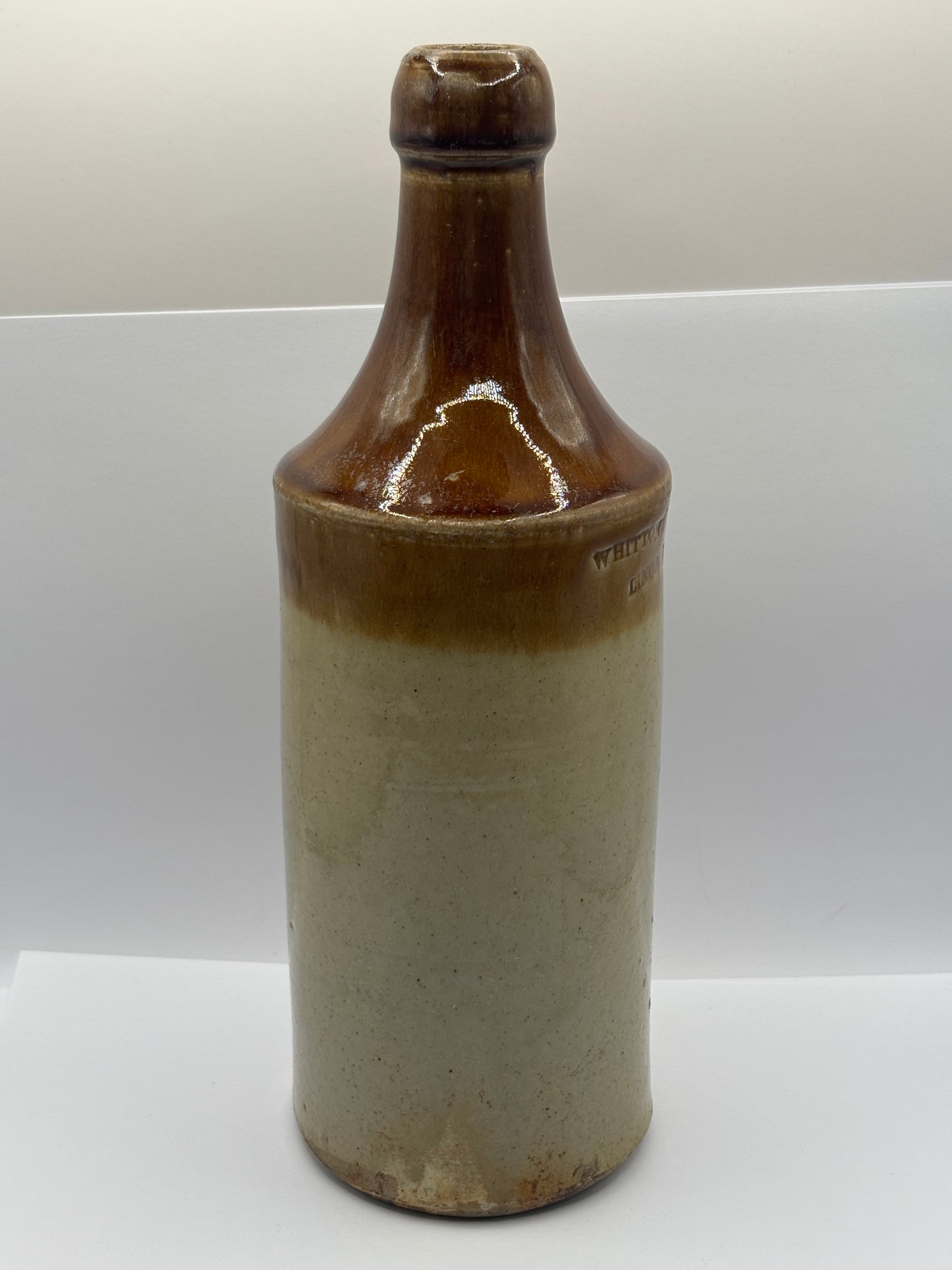 Old Lincoln stoneware bottle. porter. Whitton & ashley