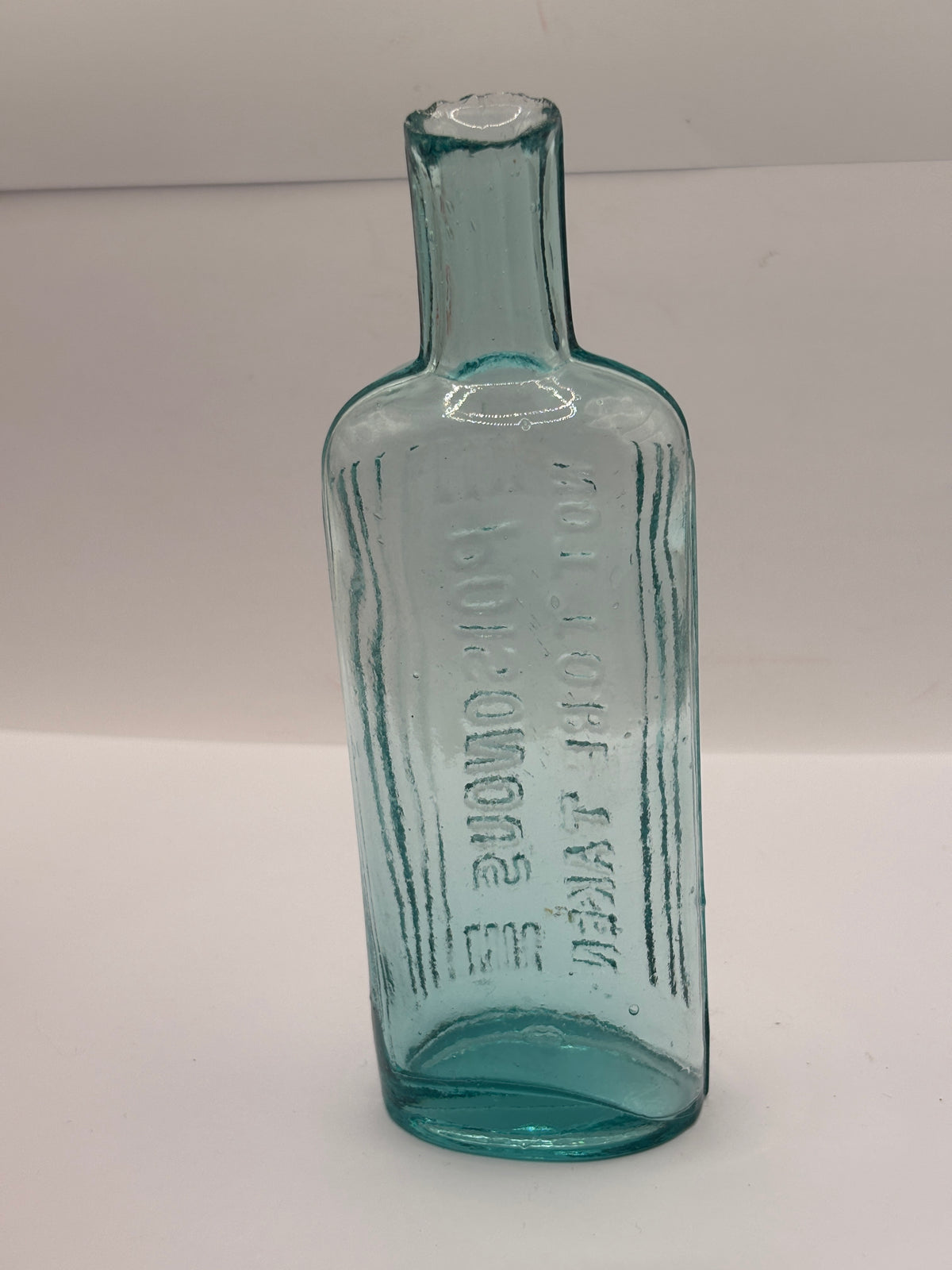 Old aqua glass poison bottle, POISONOUS Not to be taken