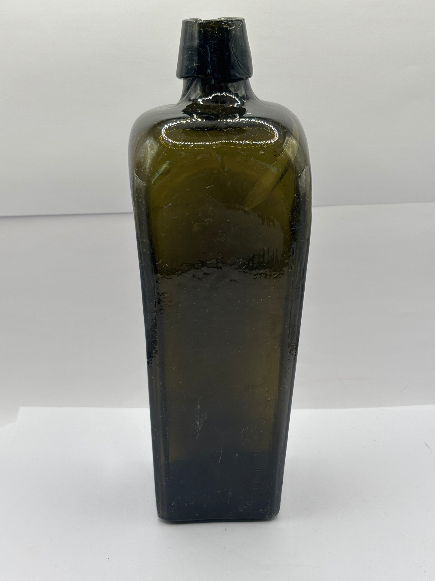 Old green glass gin bottle, case gin