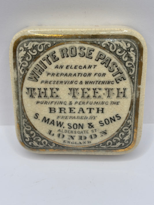 old advertising lid, White rose paste for the teeth and breath. Damaged