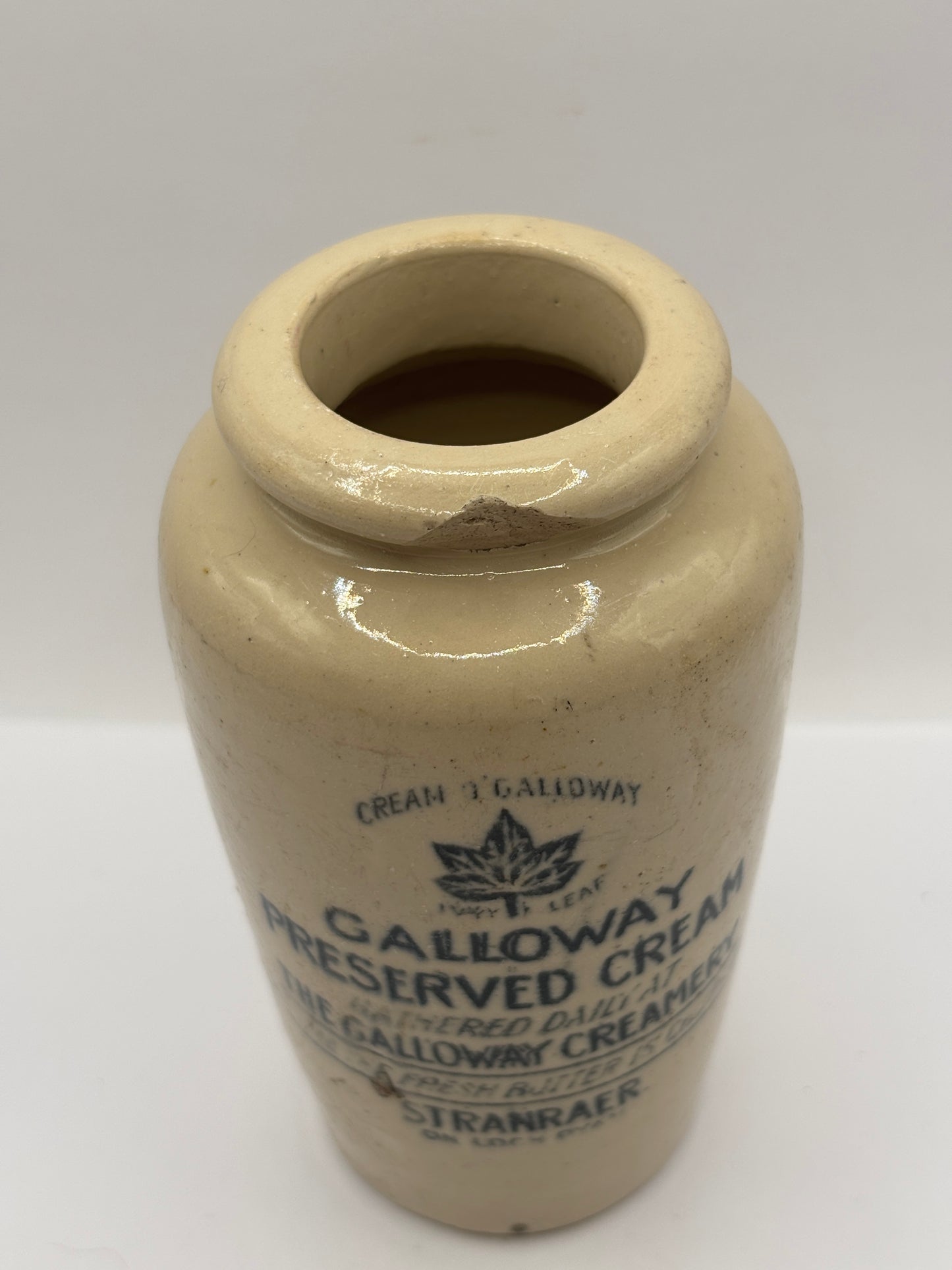 Old advertising cream pot, Galloway preserved cream. Damaged