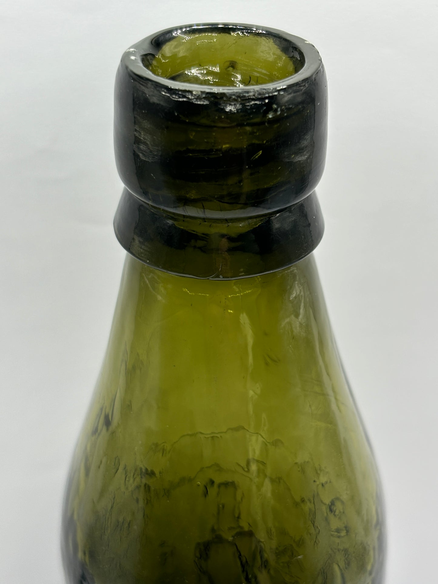 Old green glass North Sheilds beer bottle