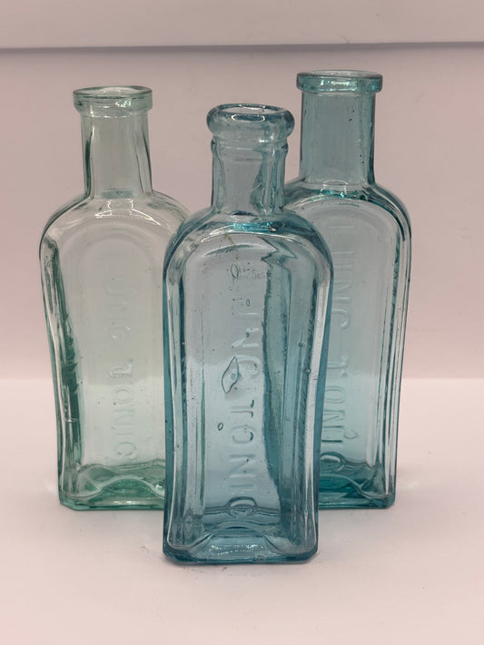 2 old aqua glass Lung tonic bottles
