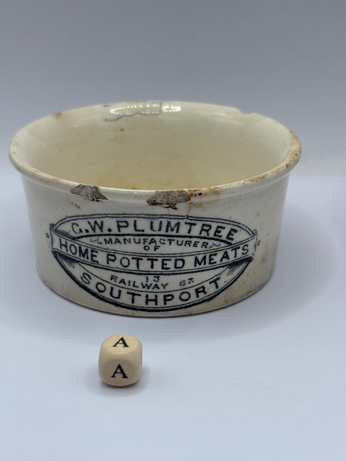 Old advertising meat paste pot, Plumtree home potted meats. Damaged (a)