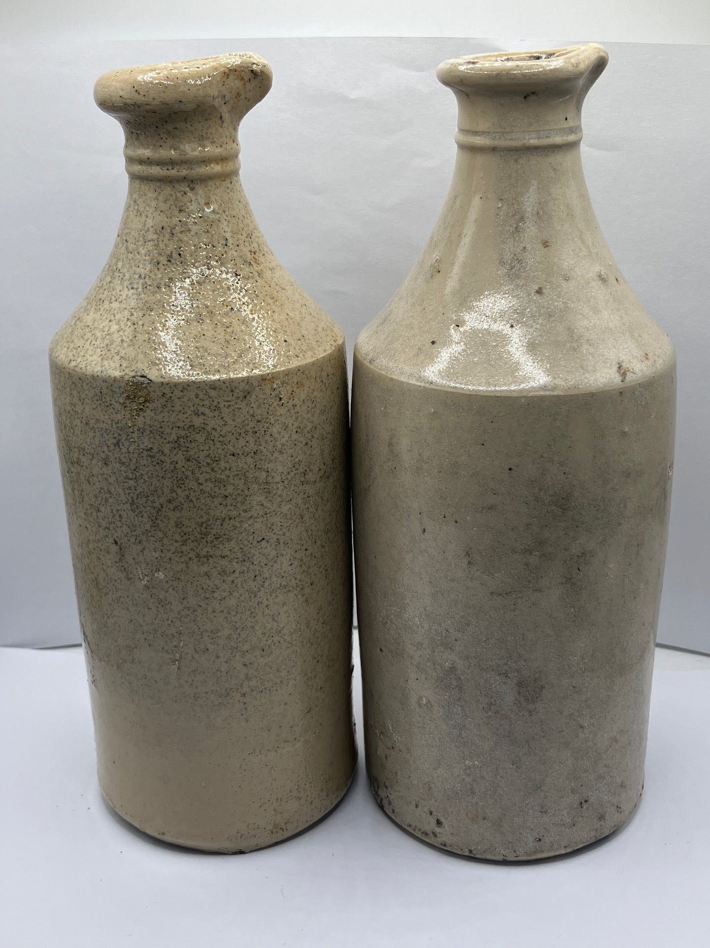 2 tall white stoneware pouring ink bottles