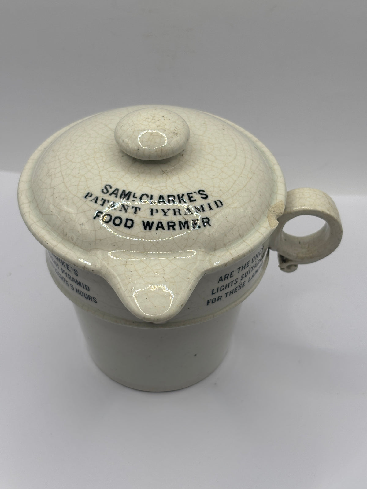 Old stoneware advertising food warmer, Clarkes pyramid food warmer & lid