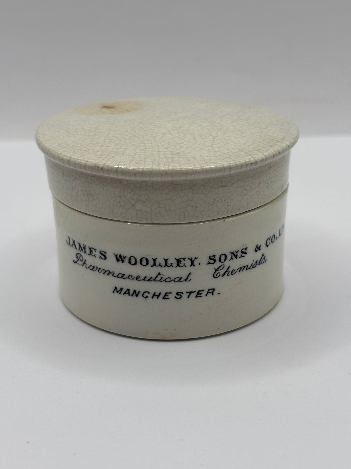 Old advertising chemist lid and base. James Woolley pharmaceutical chemist
