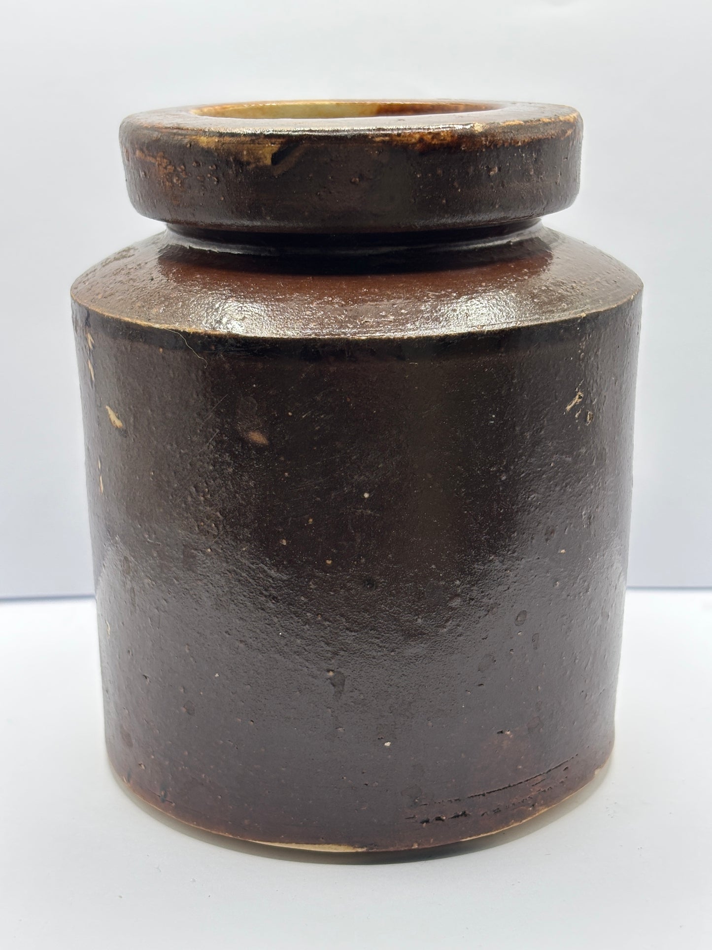 Old brown stoneware jar