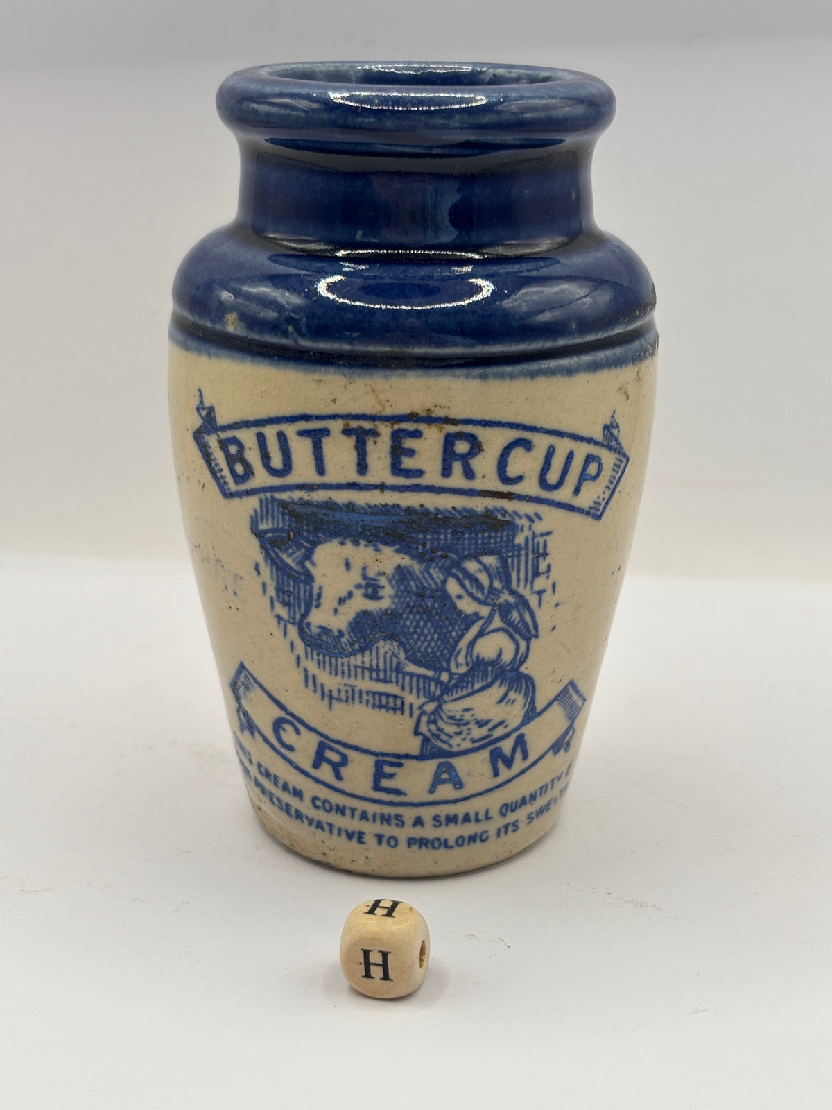 Old blue top advertising cream pot, Buttercup cream, cow & milk maid (H)