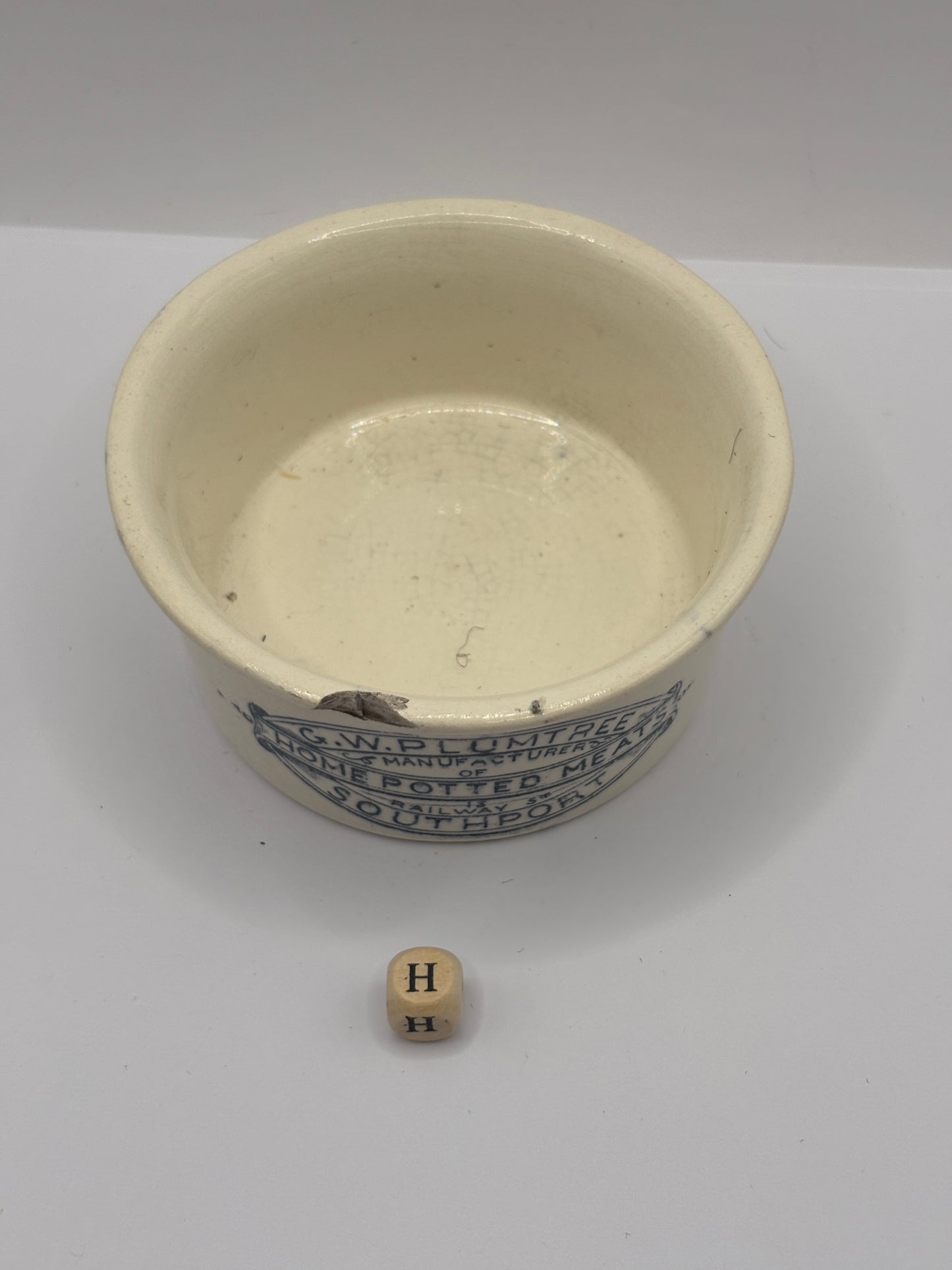 Old advertising meat paste pot, plumtrees (H) damaged