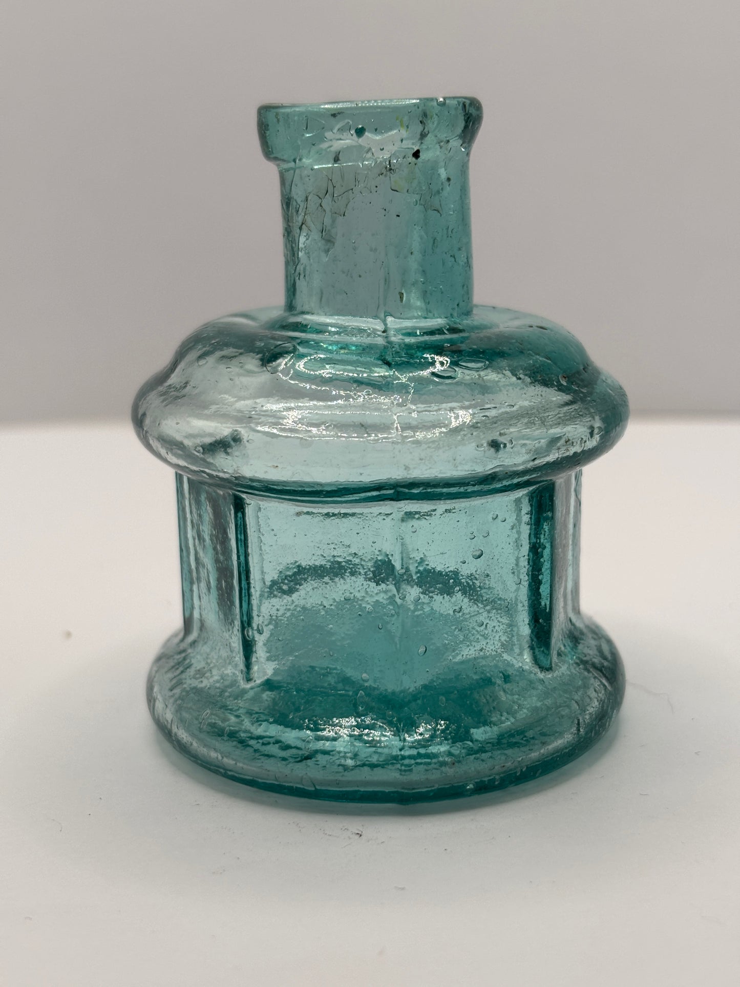 Old aqua glass ink bottle, inkwell