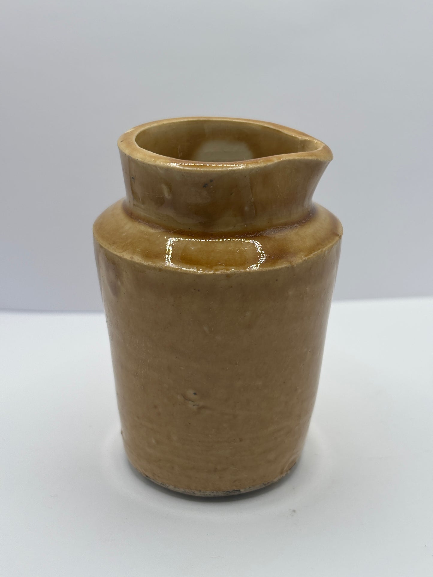 old brown stoneware cream pot