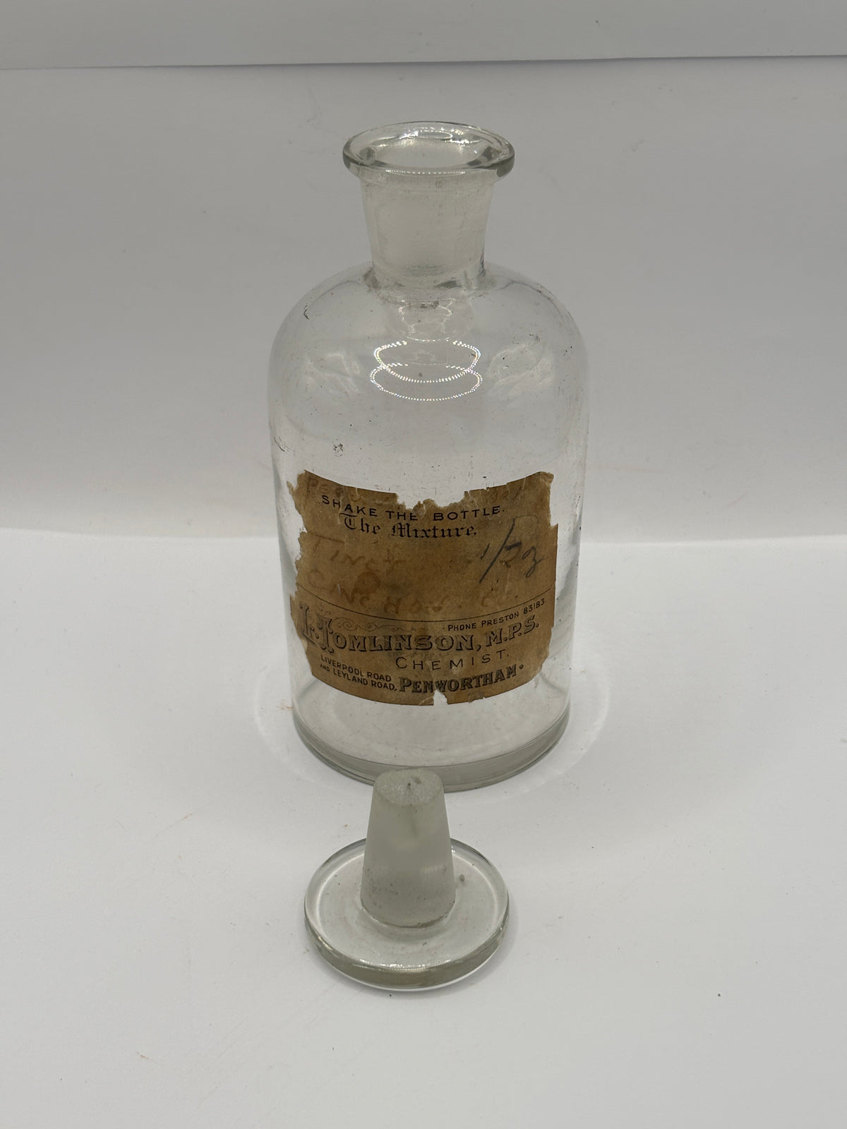 Old glass chemist round with original label and stopper